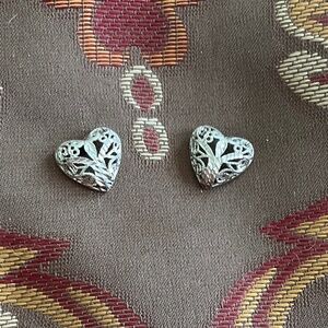 Silver Filagree heart earrings.
